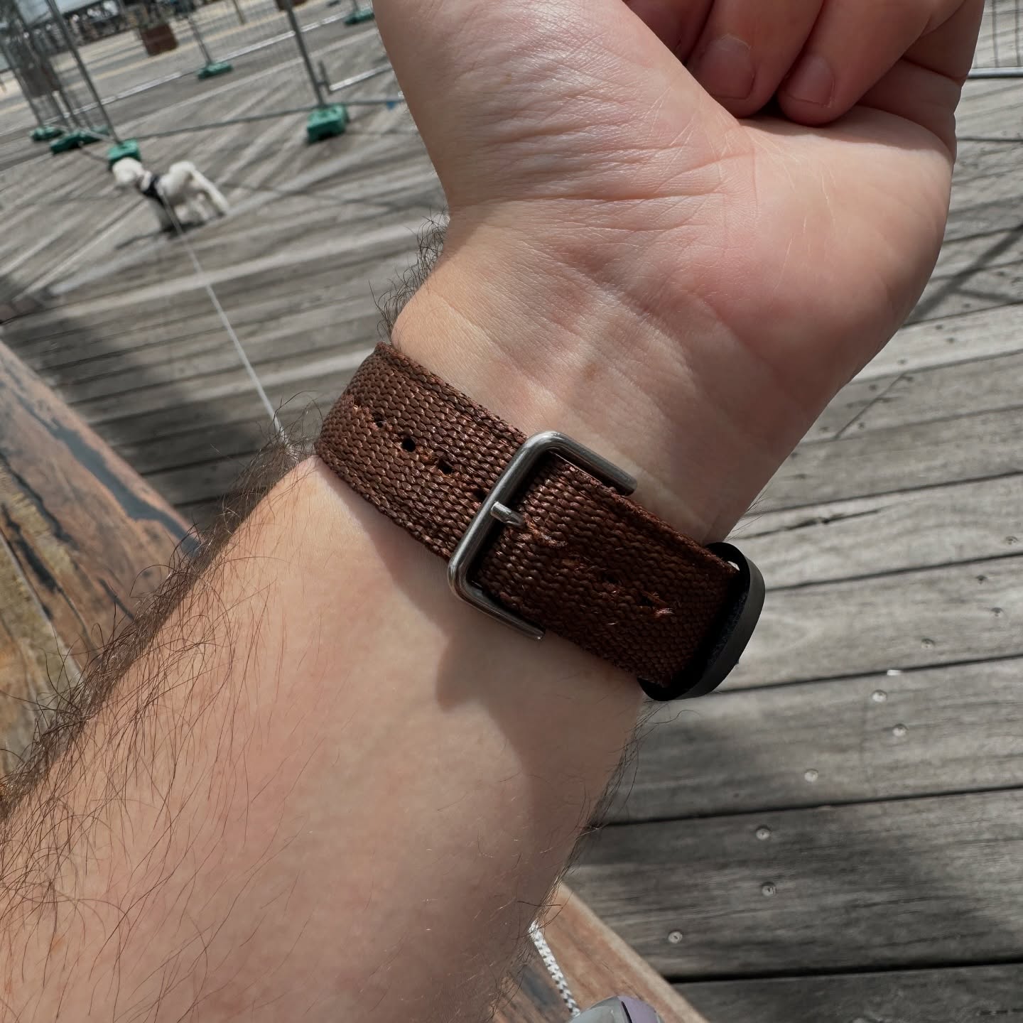 Underside of the brown two-piece strap fitted to a bronze Casio AE-1200