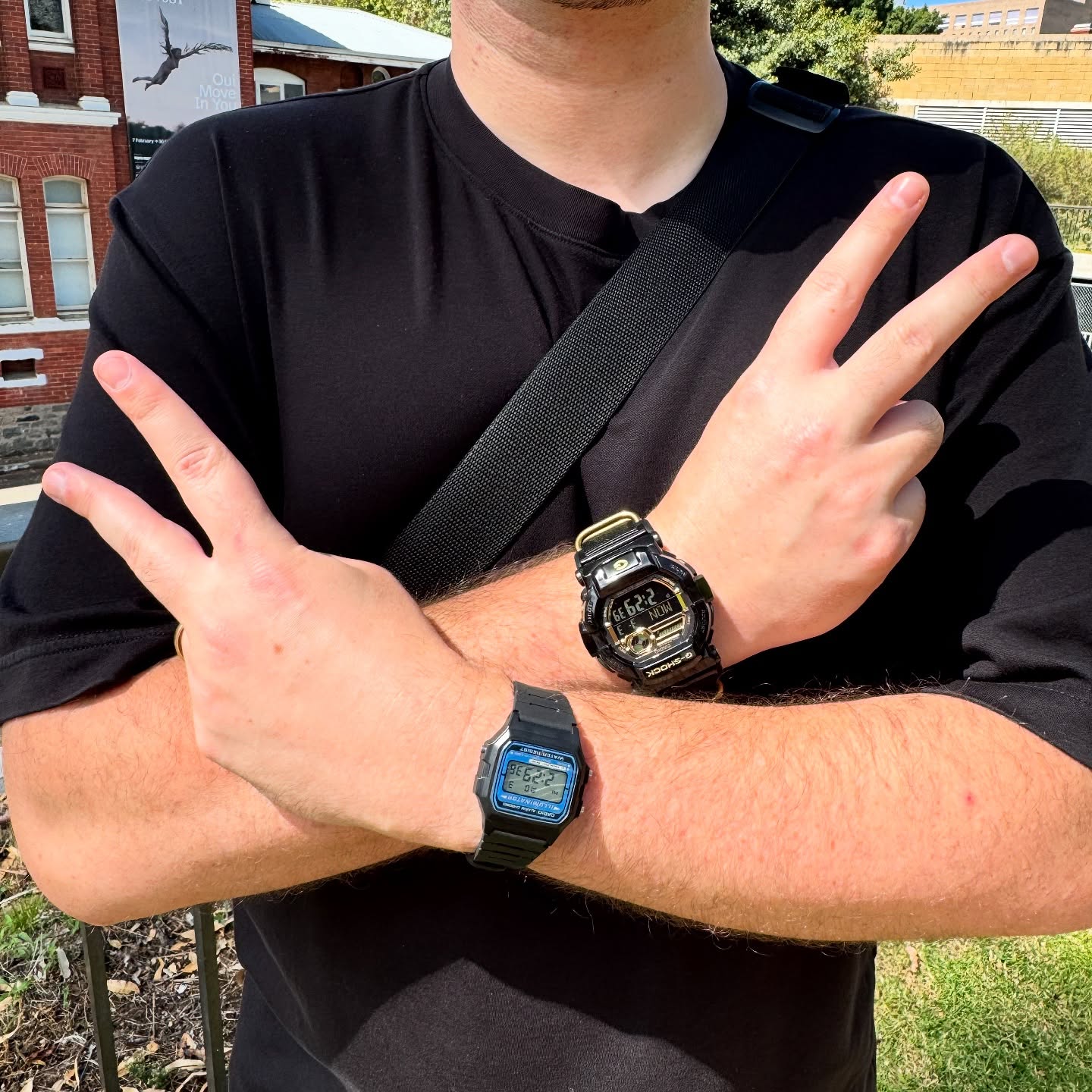 Casio F-105W and modified G-Shock GD-350 worn outdoors on both wrists