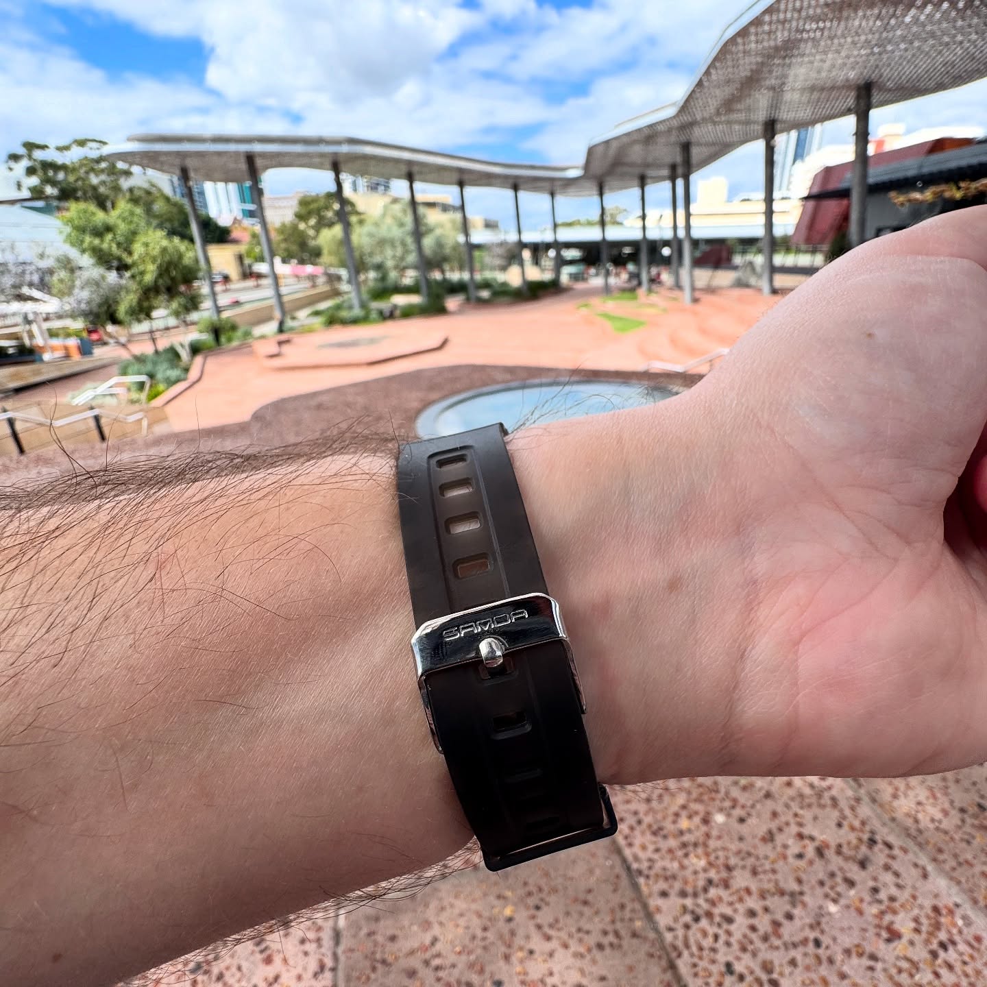 Underside strap and buckle of the SANDA 6133 on wrist