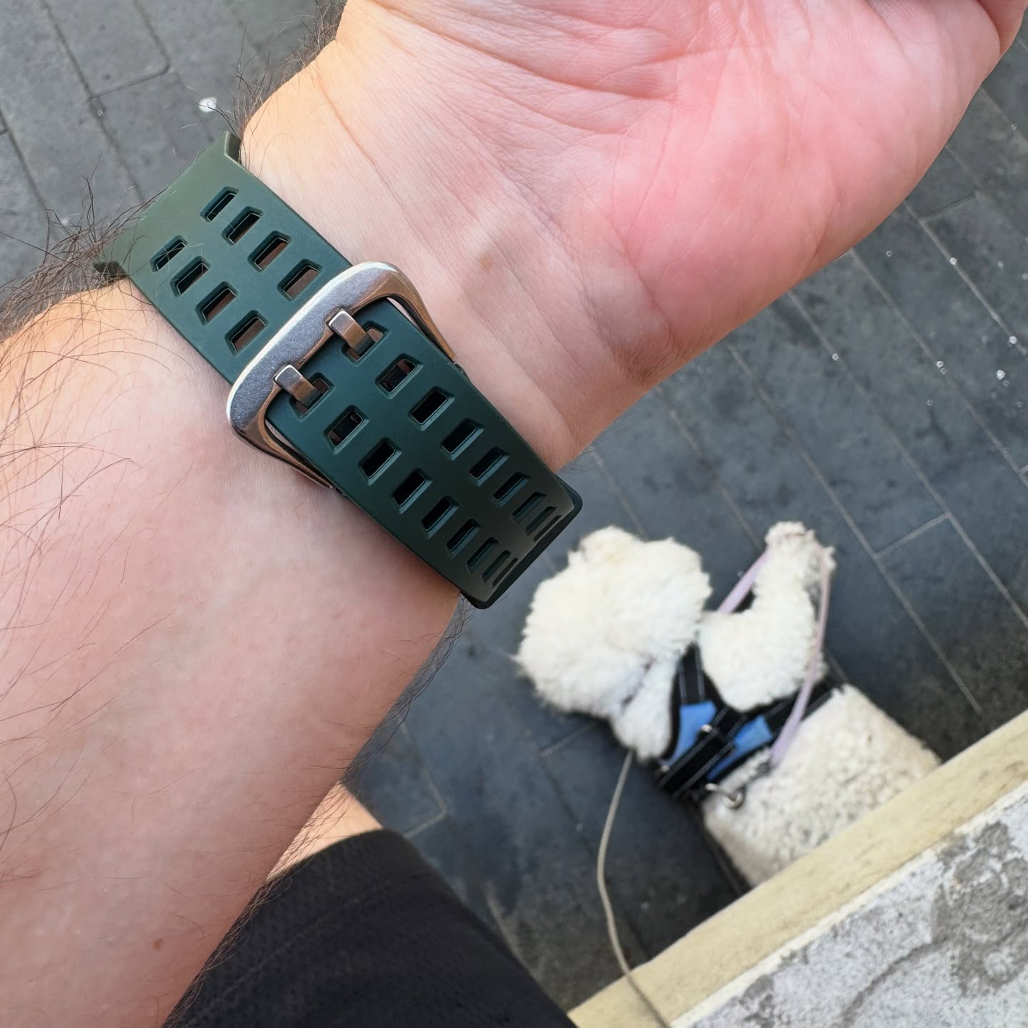 Underside of the army-green SKMEI 1988 strap with Bubble the dog in view