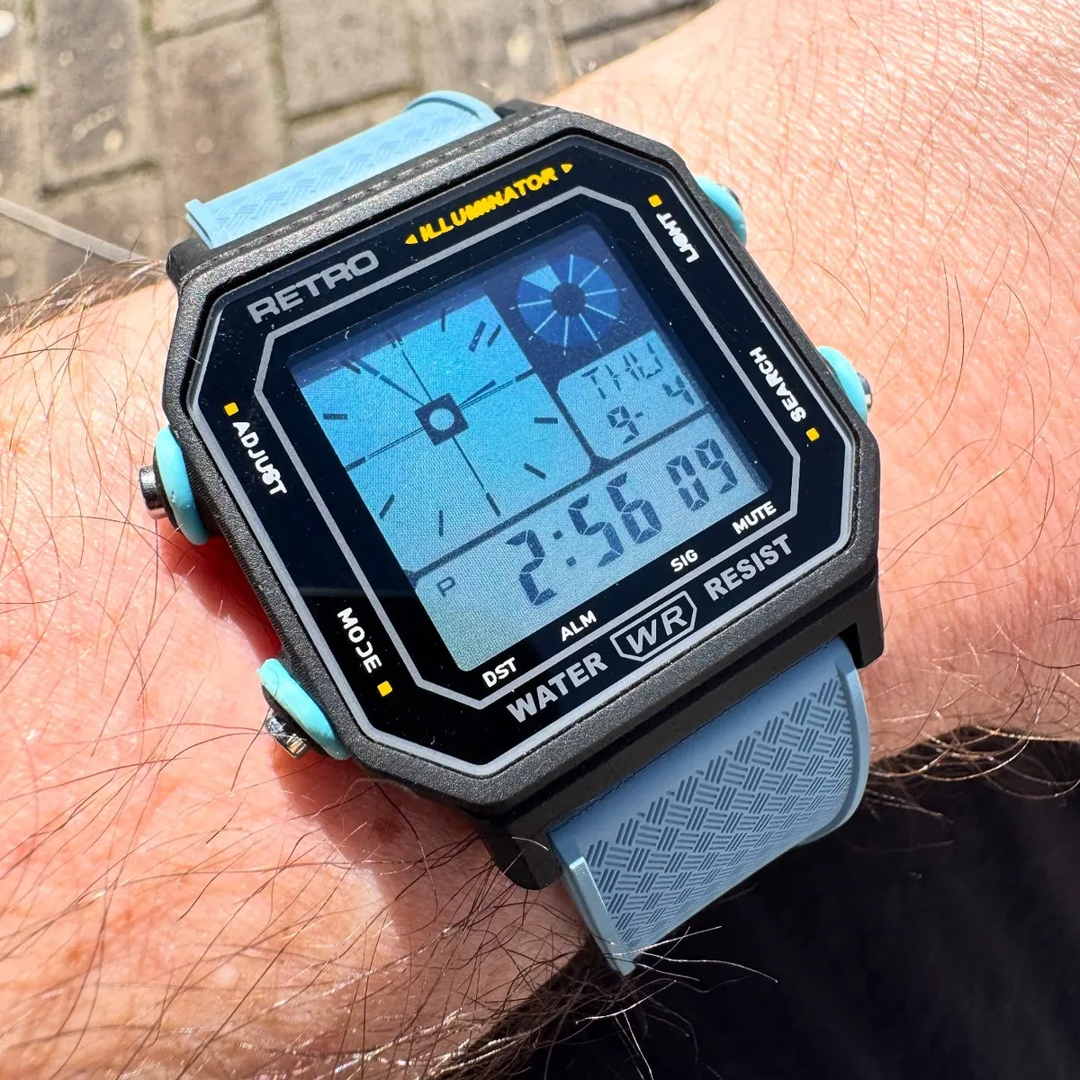 Close view of the blue Retro Revamp LF-20W display and case