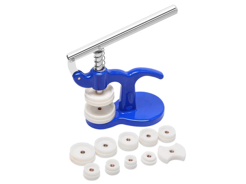 Blue hand-operated watch press with protective dies