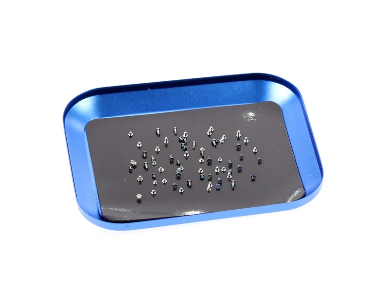 Blue magnetic tray holding small watch screws