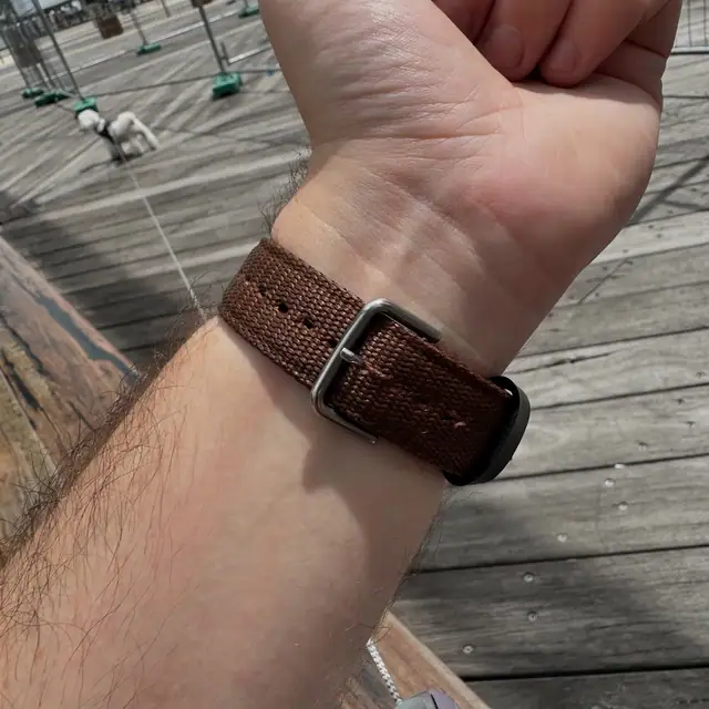 Underside of the brown two-piece strap fitted to a bronze Casio AE-1200