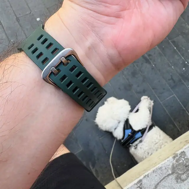 Underside of the army-green SKMEI 1988 strap with Bubble the dog in view